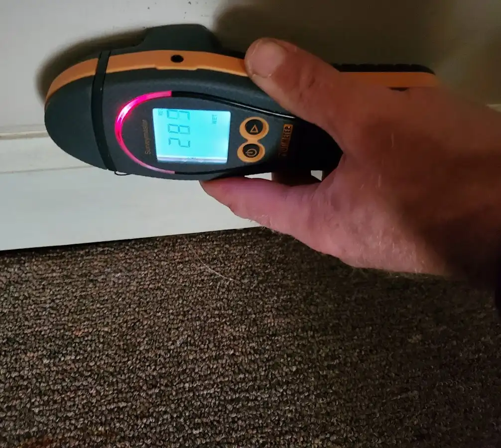 Moisture detection at baseboard during Burst Pipe Cleanup in Cambridge